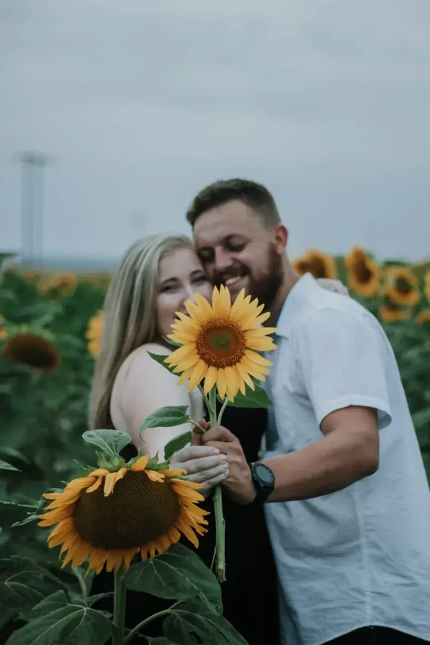 Close-up of a couple touching foreheads at sunset